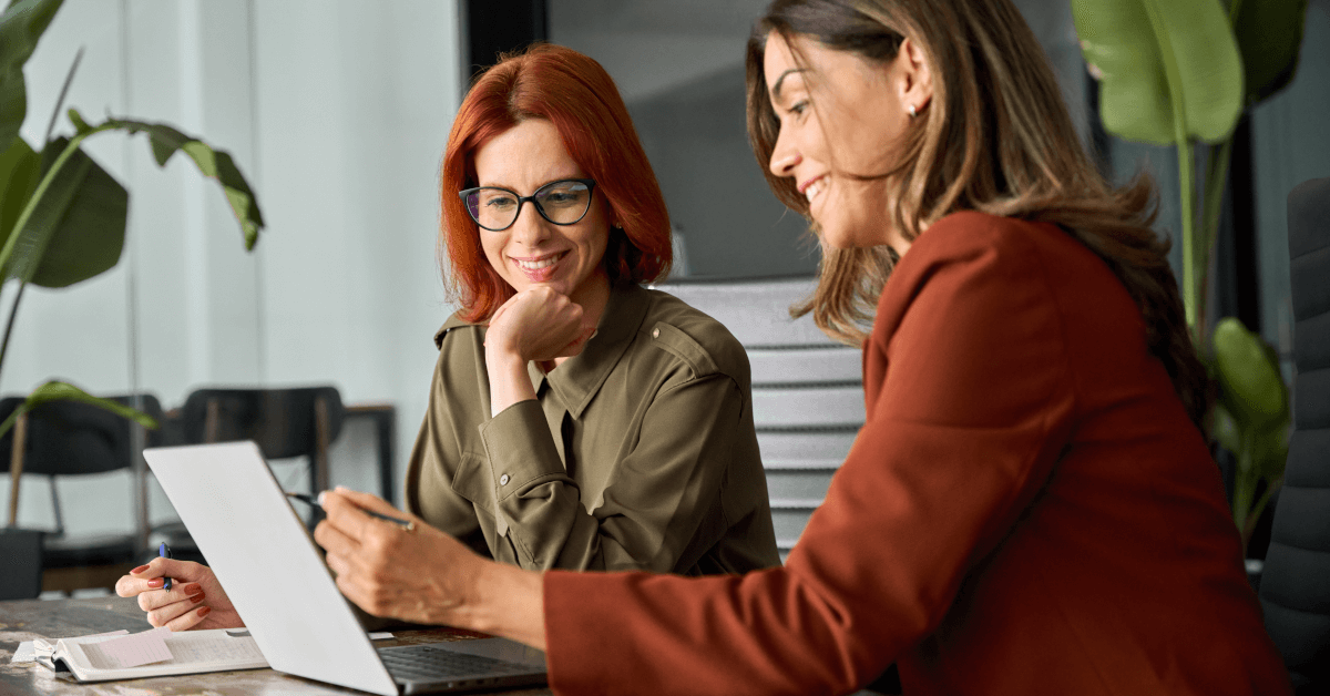 Two happy customer service agents.